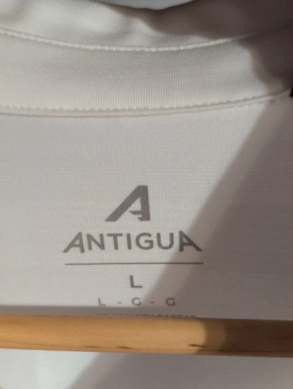 Antigua White Polo with Embroidered Steelers Patch